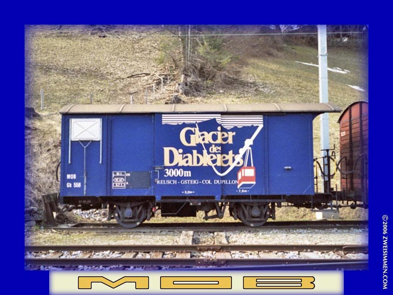 Gk558: MOB advertising boxcar 'Glacier de Diablarets', at Gstaad, 2003