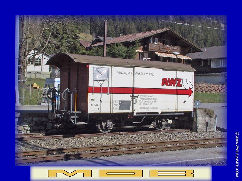 Gk502: MOB advertising boxcar 'AWZ', LH & front, at Zweisimmen, October 21, 2005