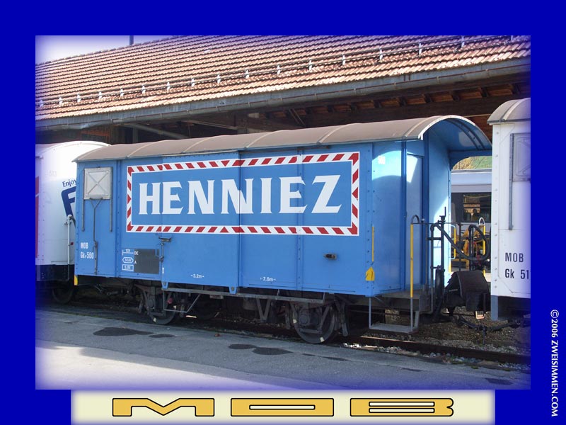 Gkv560: MOB advertising boxcar 'Henniez', at Zweisimmen, October 21, 2005