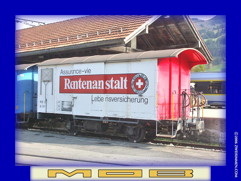 Gk511: MOB advertising boxcar 'Rentenanstalt', at Zweisimmen, October 21, 2005