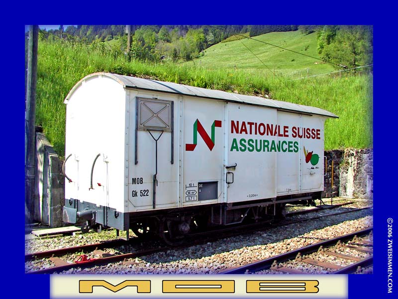 Gk522: MOB advertising boxcar 'Nationale Suisse Assurances, location unknown but near Les Avants, October 19, 2001