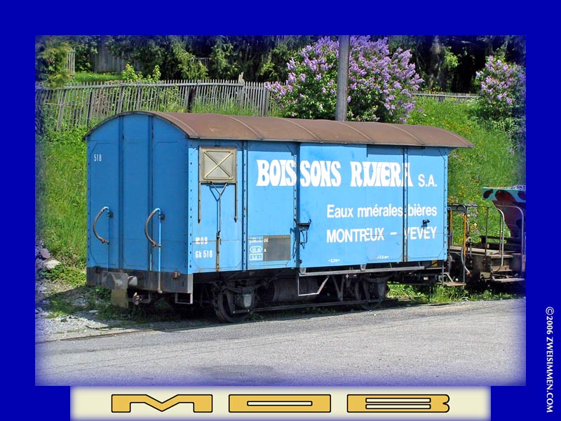 Gk518: MOB advertising boxcar 'Boissons Riviera', RH & rear, location unknown but near Les Avants, October 19, 2002